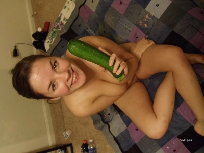 Girl with big breasts masturbates with vegetables