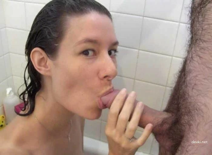 Chick in the bathroom takes her boyfriend's cock in her mouth
